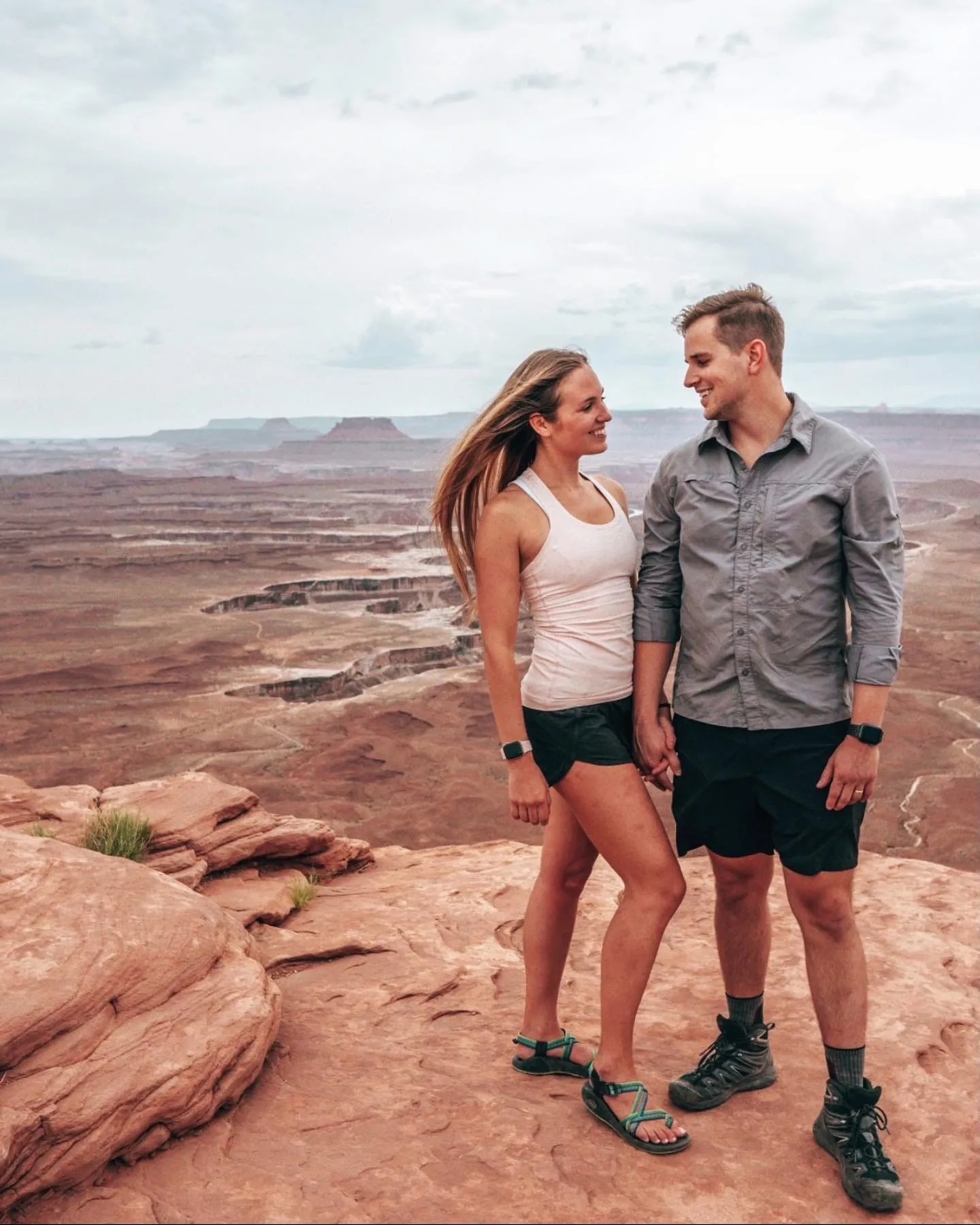 Kiersten and Ryan on the red rock rim at Canyonlands National Park